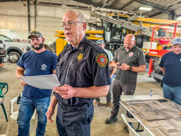 First responders look on as they prepare to begin the exercise